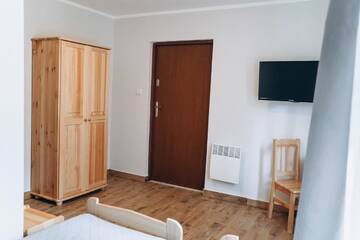 Фото номера Двухместный номер с 1 кроватью Комплексы для отдыха с коттеджами/бунгало Komandor Ośrodek Wczasowy г. Погожелица 11