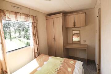 Фото номера Шале с двумя спальнями Кемпинги Holiday Lodge Camping г. Погожелица 3